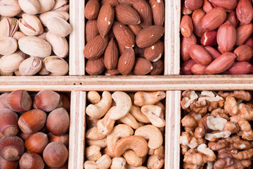 Mix nuts on wooden table,healthy vegan food.