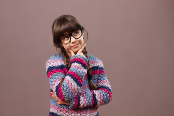 Little nerdy girl thinking