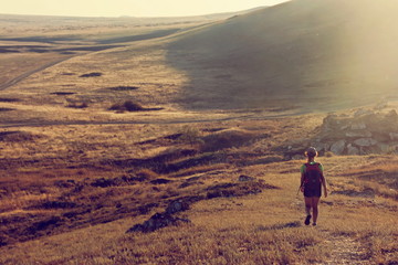 Woman hiking with backpack