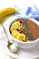 Chocolate banana smoothie with walnuts and chia seed.