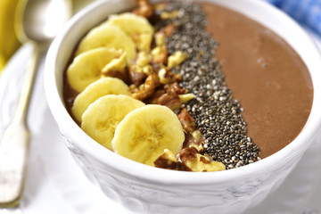Chocolate banana smoothie with walnuts and chia seed.