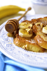 French toasts with banana,walnuts and cinnamon.