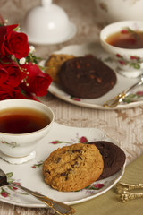Cup of Tea with Chocolate Chip and Oatmeal Cookies with Roses