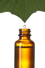 Drop falls into a brown bottle