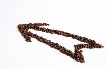 The way to pleasure.Arrow made from coffee beans.Isolated