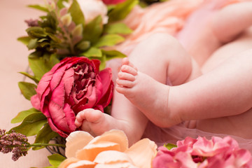 Lovely infant foot with flowers