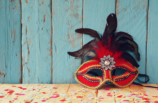 colorful Venetian masquerade mask. selective focus. vintage filtered