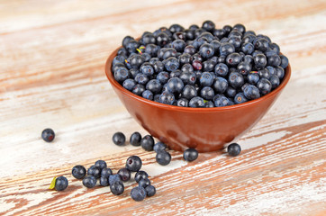 Fototapeta na wymiar Blueberry on wooden background