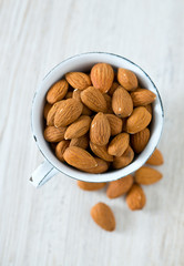 almonds on wooden surface