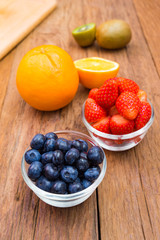 Fresh, Various fruit, strawberry, blueberry, kiwi, orange.