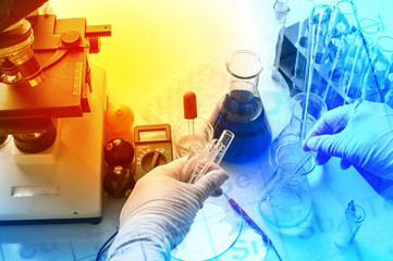 science laboratory test tubes with periodic table background