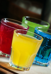 Multi-colored festive alcoholic cocktails, selective focus