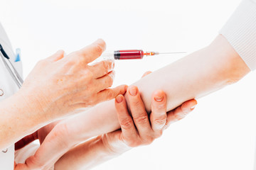 Nurse holding syringe