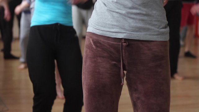 Beautiful girls are engaged in the gym. Ashtanga yoga