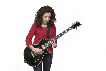 Obraz premium Woman Playing Electric Guitar Isolated On White Background