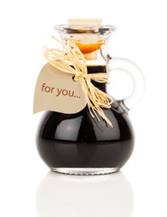 maple syrup in glass bottle or herbal syrup, ardent drink, mixtu
