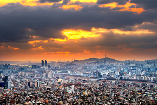 View of Seoul tower and cityscape with golden light in Seoul, So