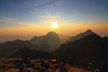 view from peak of the mountain in sunset time