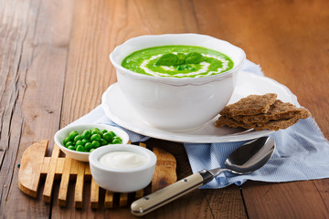Green peas soup in a bowl