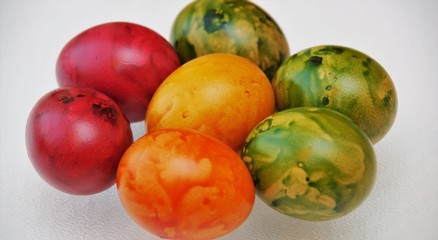 Fototapeta na wymiar Easter eggs on a glass table
