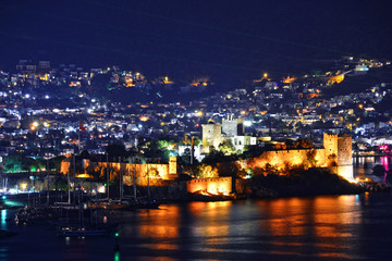 Fototapeta na wymiar View of Bodrum harbor and Castle of St. Peter by night