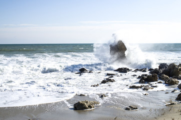 Breaking waves in the lonely cliff