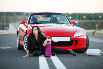 girl near red car