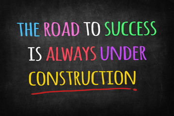 The road to success concept on blackboard