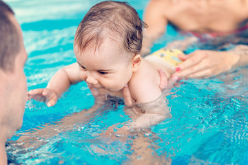 Fototapeta na wymiar Baby boy swimming