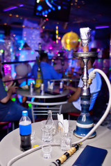Close-up photo of hookah with tube