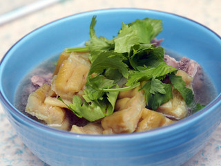 Green bitter melon or bitter gourd with spareribs clear soup