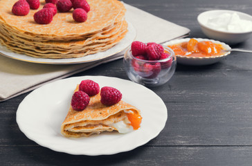 stack of pancakes on a white porcelain plate