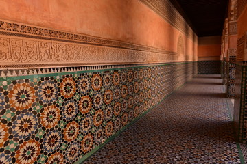 Medersa Ben Youssef, Marrakech, Morocco, Africa. The courtyard ornately tiled mosaic walls and...