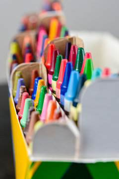 Crayons stacked on art material