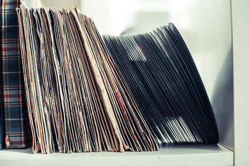 Vintage 45s vinyl row on house shelf