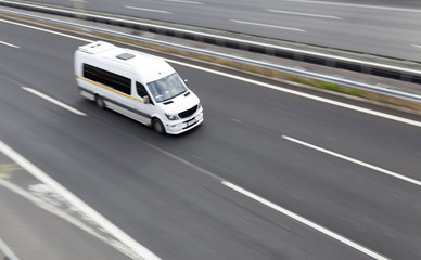 Obraz na płótnie Canvas Panning vehicle on the highway