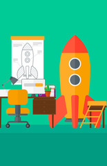 Background of workspace with business start-up rocket.