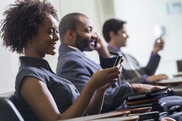 African American Woman Girl Texting on Cell Phone Airport