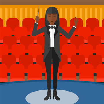 Conductor directing with baton.