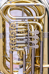brass bass tuba with valves closeup
