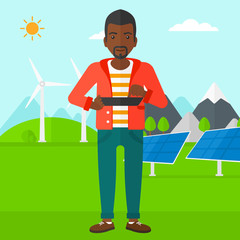 Man using tablet computer.