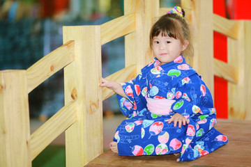 Little girl in yukata traditional dress