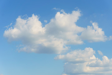 Blue sky with clouds background