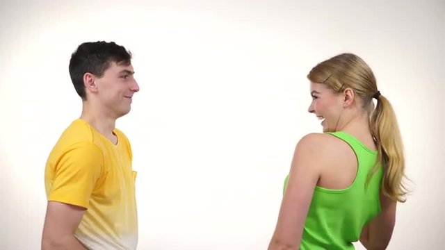 Couple fit woman and man joyful giving high five in celebration 4K