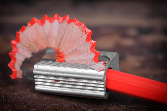 Pencil Sharpener On Wooden Wall