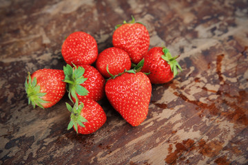 strawberries on the wooden background