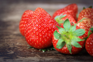 strawberries on the wooden background