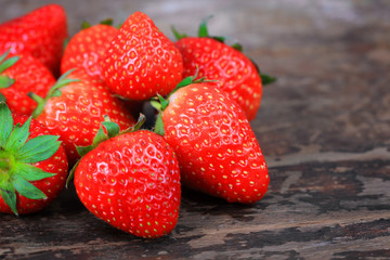 strawberries on the wooden background