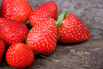 strawberries on the wooden background
