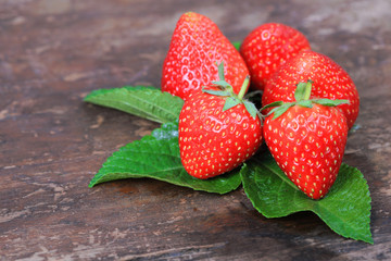 strawberries on the wooden background